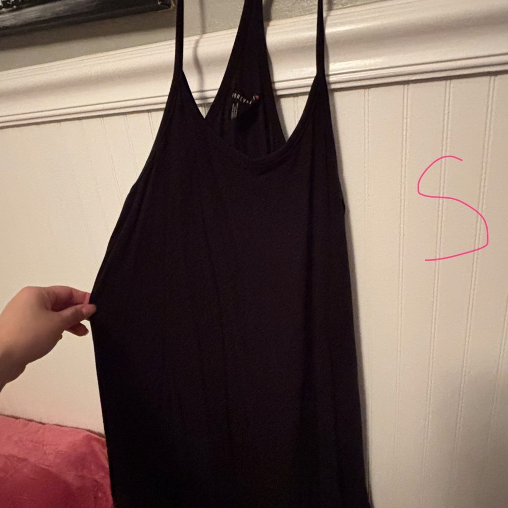 Woman’s black flowy summer dress